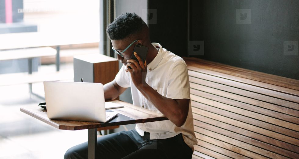 Online student in a coffee shop