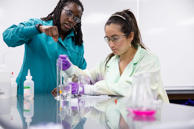 Chemistry student with faculty member in lab